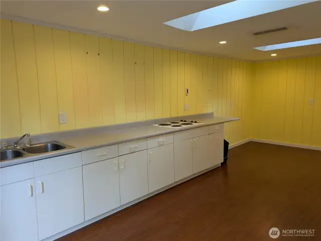 Exercise/guest space even has a sink and cooktop.