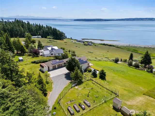 The fenced Orchard is fully fenced with a gate.  Those Solar Panels will save you money!