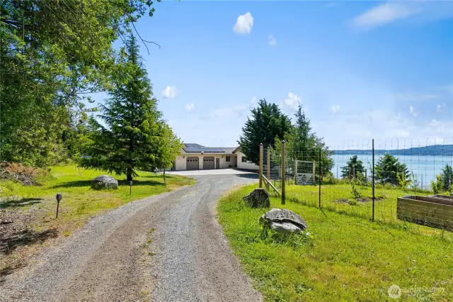 This is the driveway as you enter the property from Strawberry Point Rd.  The property is secluded and private.