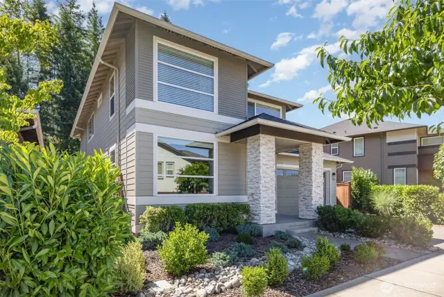 This meticulously designed 4-bedroom 2.5-bath house features an open main floor layout with a spacious den.