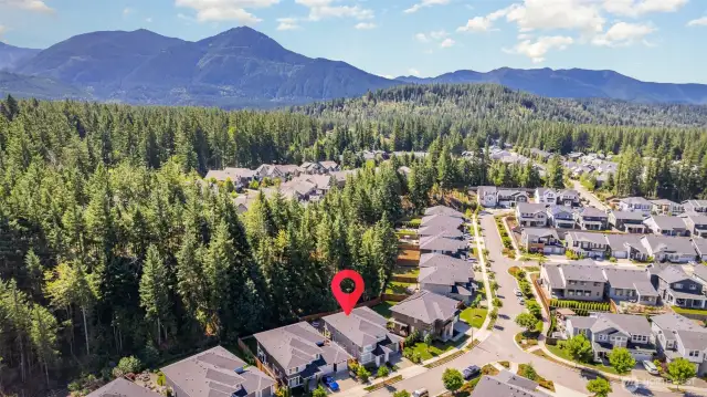 Property backs to a serene, protected greenbelt—offering privacy and a natural backdrop.