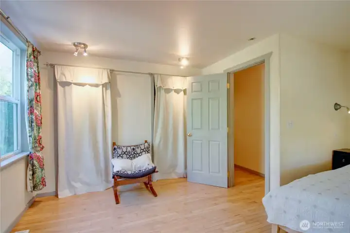 Two spaces for your clothes and room for a chair or two.