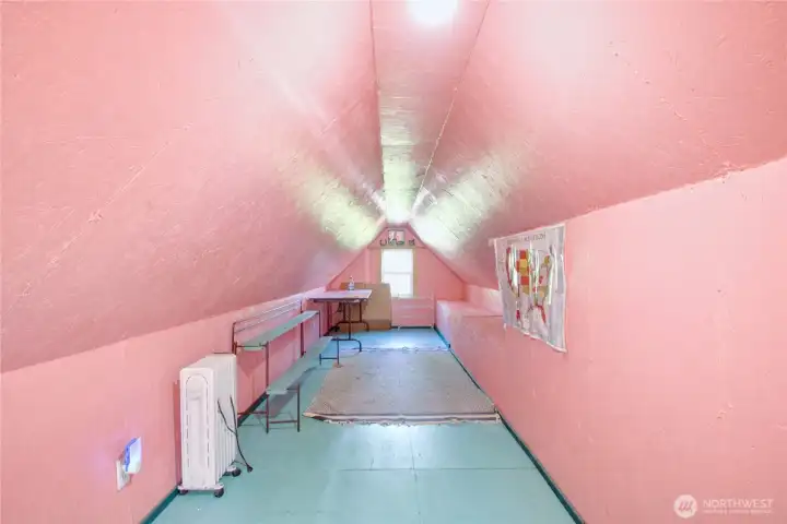 Attic is spacious and can be used for whatever your needs are. Plenty of room for storage.