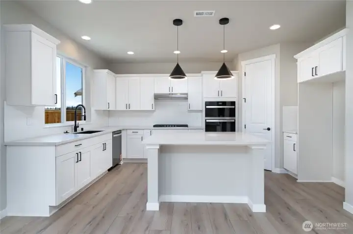 Photos are of a home in a different community and are for illustration purposes only to reflect typical finishes.  May depict seller enhancements.  Colors and options may vary.