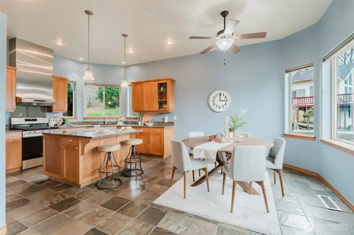 Kitchen with eating space, both room for a dining table and bar seating