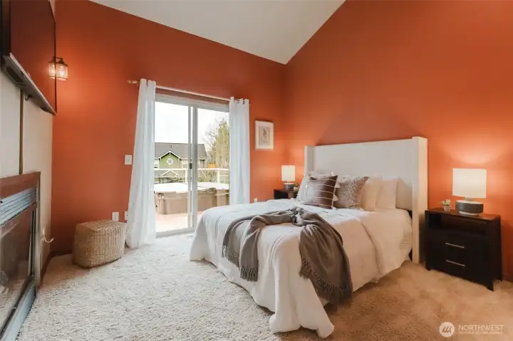 Primary bedroom with deck and hot tub access
