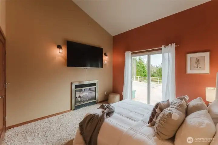 A gas fireplace anchors the space