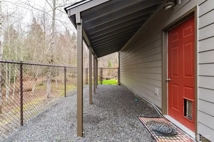 Dog run with easy access from the garage, as well as two gates - one at each end.