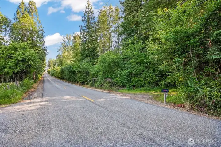 This is viewing South, entrance in this photo is just next to the mailbox