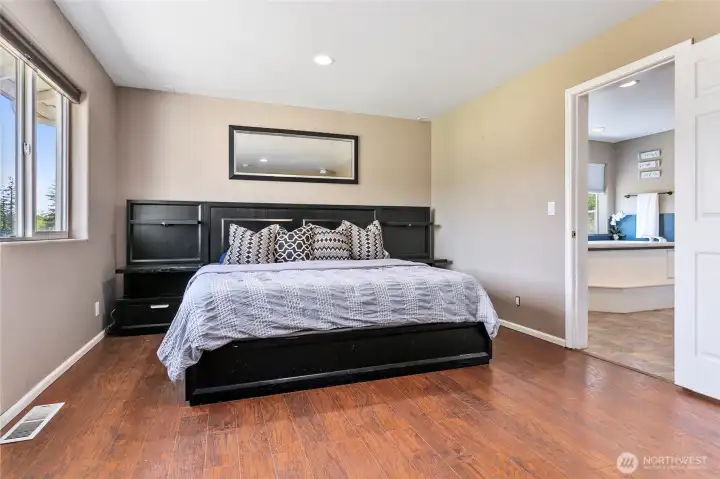 Extra-large primary suite is upstairs with full bathroom and walk-in closet.