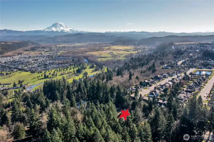 Situated on over two serene Acres in South Hill!