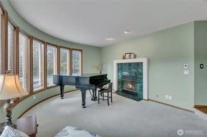 Another view the living room with gas fireplace