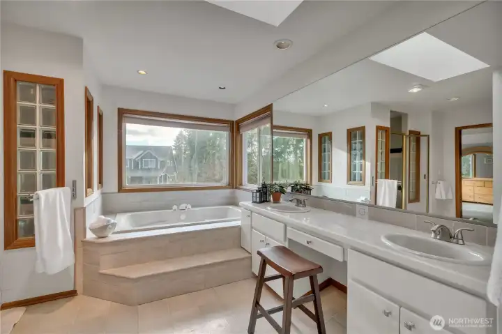 Wonderful primary bathroom with soaking tub, skylights & more!