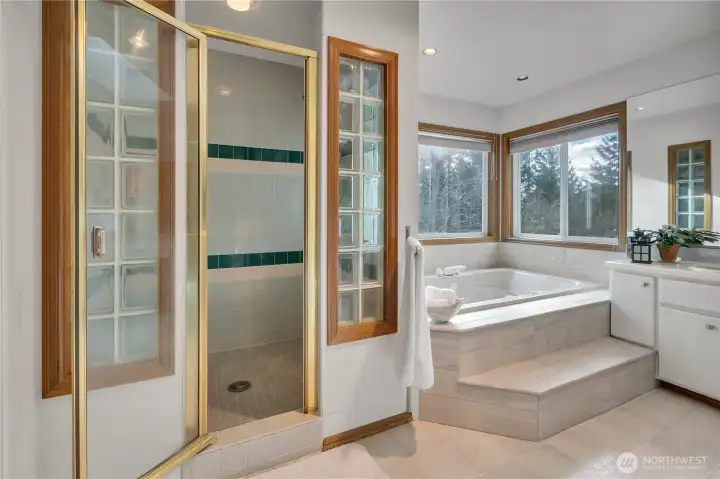 Primaryt bath also has a large custom tile walk-in shower!