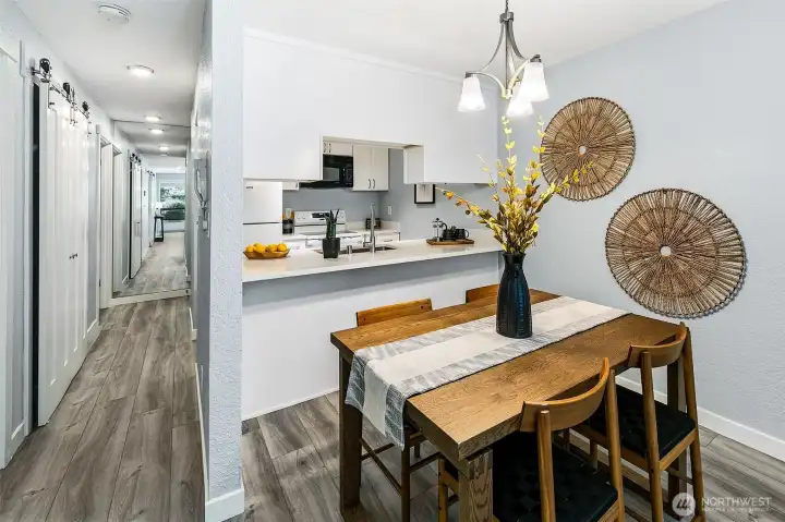 New kitchen and full sized dining area. Down the hall find a full laundry, pantry and bath.