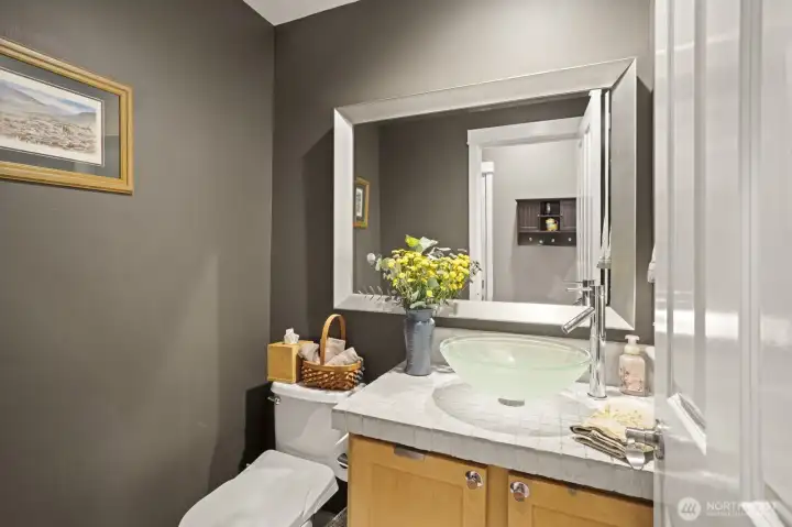 Powder room downstairs for guests to use. Powder room downstairs for guests to use.