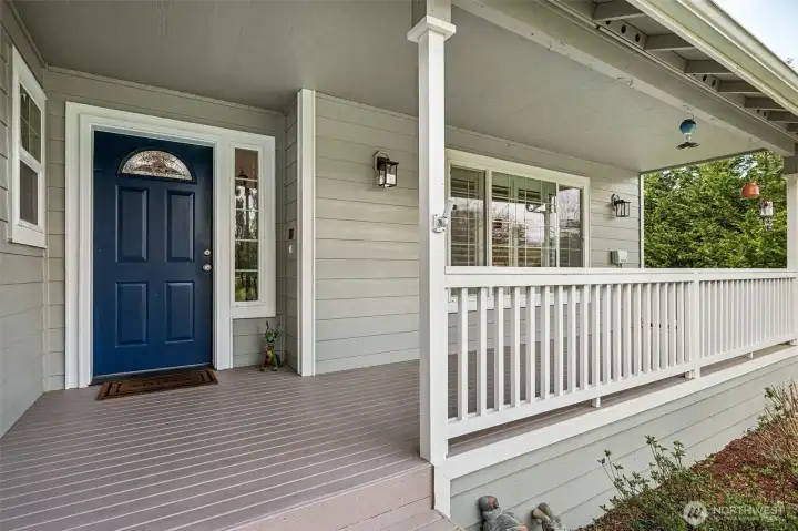 Fully covered inviting front porch provides an area to relax.