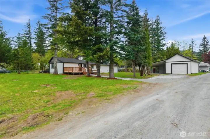 Enjoy a detached one car garage with attached carport
