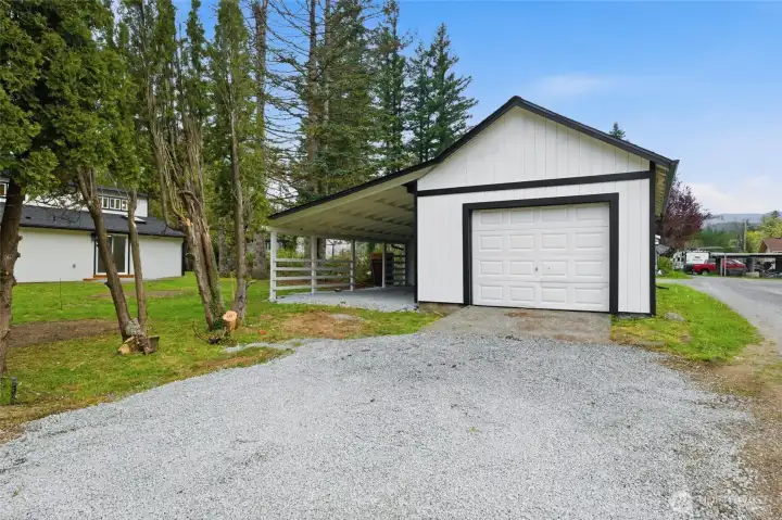 Detached one car garage with attached carport