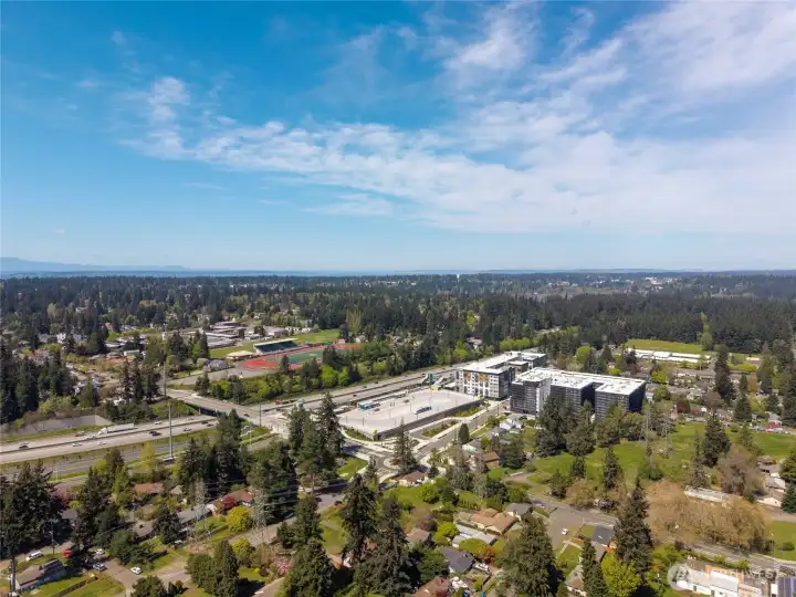 Aerial facing NW. Light Rail Station near by.