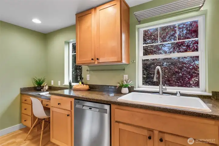 Kitchen area offers a desk/nook