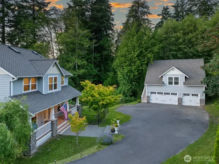 Spacious driveway & 3-car garage with a shop Spacious driveway & 3-car garage with a shop