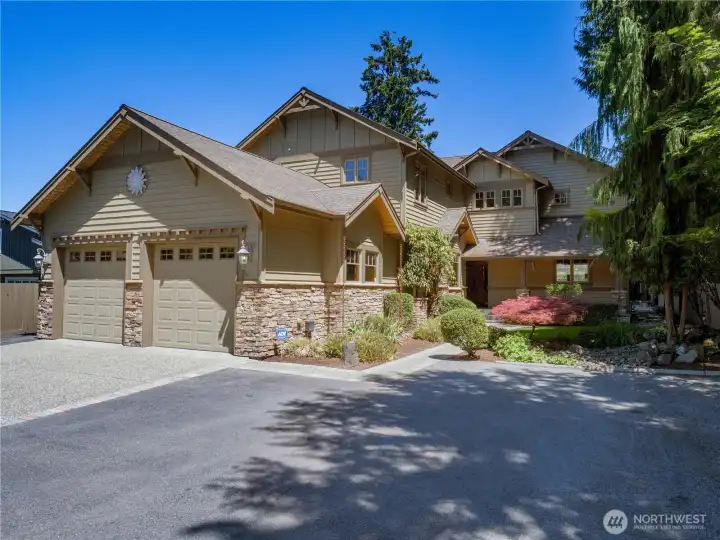 A beautifully crafted exterior sets the tone for this remarkable waterfront residence. Showcasing classic Craftsman-inspired design, stone accents, and meticulously maintained grounds, the home offers a refined presence from the moment you arrive. A beautifully crafted exterior sets the tone for this remarkable waterfront residence. Showcasing classic Craftsman-inspired design, stone accents, and meticulously maintained grounds, the home offers a refined presence from the moment you arrive.