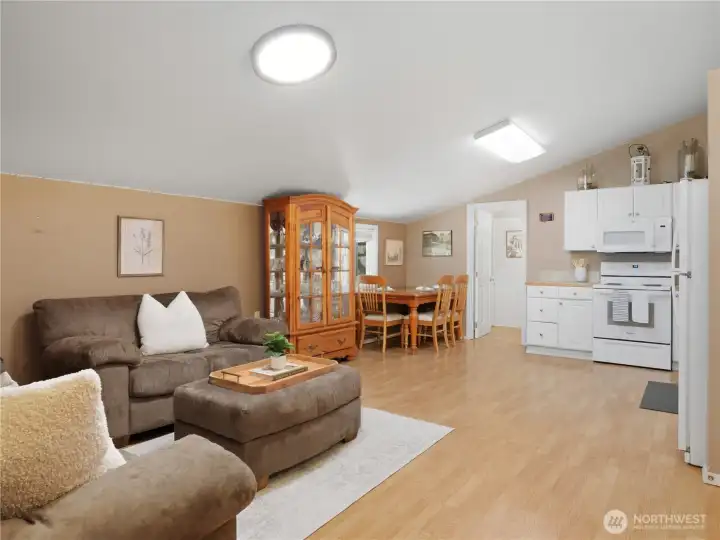 Versatile living space featuring an open-concept layout with a comfortable gathering area, dining space, kitchenette, and private bath. Ideal for guests, extended living arrangements, hobbies, recreation, or flexible everyday use. Versatile living space featuring an open-concept layout with a comfortable gathering area, dining space, kitchenette, and private bath. Ideal for guests, extended living arrangements, hobbies, recreation, or flexible everyday use.