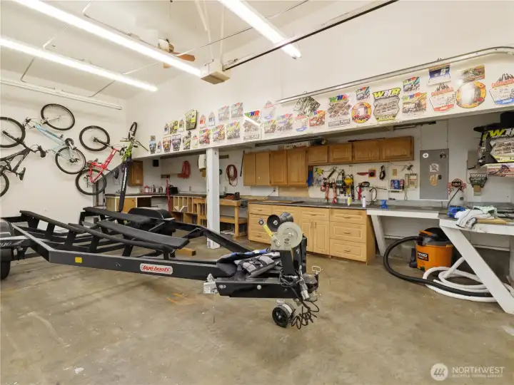 Waterfront living isn't just about the shoreline, it's about having the space to fully enjoy it. From boats and paddleboards to recreational equipment, projects, and storage, this substantial garage and shop provide the flexibility and functionality that make life at the lake effortless. Waterfront living isn't just about the shoreline, it's about having the space to fully enjoy it. From boats and paddleboards to recreational equipment, projects, and storage, this substantial garage and shop provide the flexibility and functionality that make life at the lake effortless.