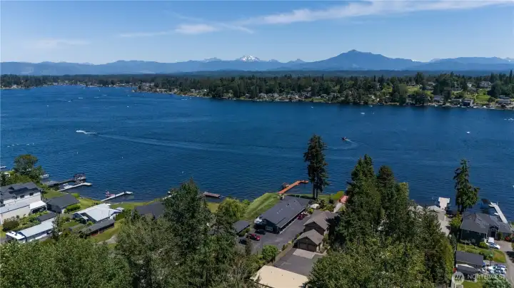 Panoramic views span Lake Stevens and the Cascade Mountains, creating an unforgettable backdrop for waterfront living. Panoramic views span Lake Stevens and the Cascade Mountains, creating an unforgettable backdrop for waterfront living.