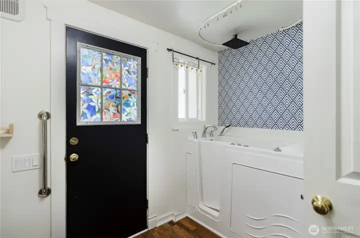 ADA jetted sitting tub/shower.