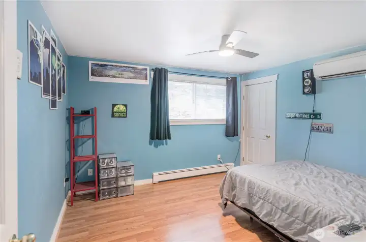Bedroom one.  Each room has their own ductless mini split offering energy efficiency and year around comfort.