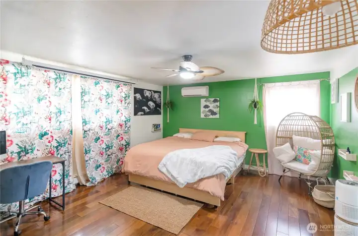 Primary suite has engineered hardwood floors and is located separately from the other 3 bedrooms.