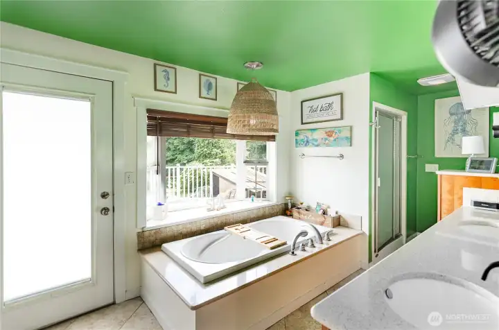 Enjoy the perfect spa experience with this deep soaking tub, plus oversized shower with steam.