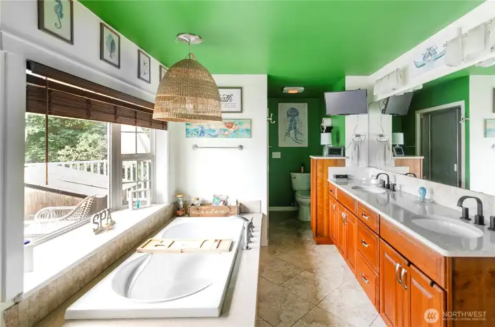 Large updated vanity has two sinks and lots of storage.