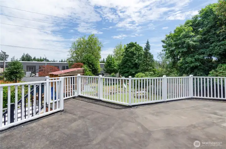Spacios large deck with room for a hot tub or seating area.