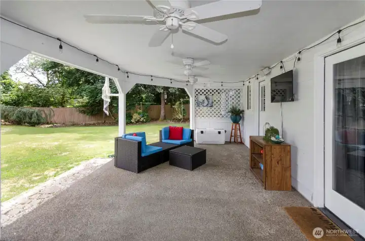View of the lower patio.  There is loads of covered space to entertain no matter what the weather is.