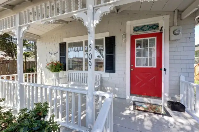 Your own deck with bench to relax on and your cheerful red door  to enter your Gull Cottage.