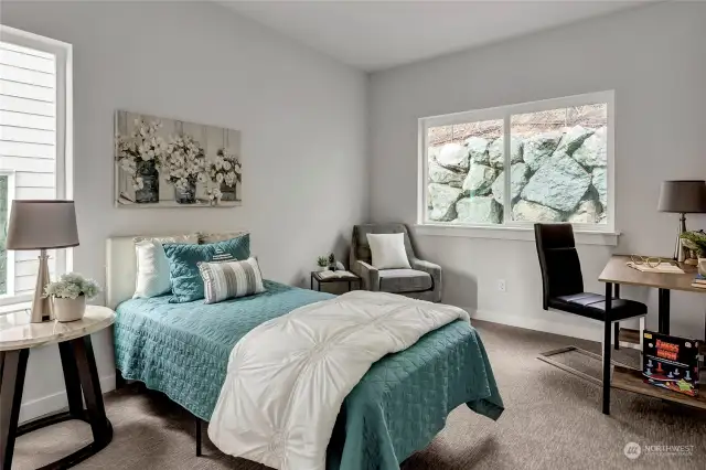 Second floor bedroom with connected bathroom (all interior photos are from lot 24 model home - same floorplan)