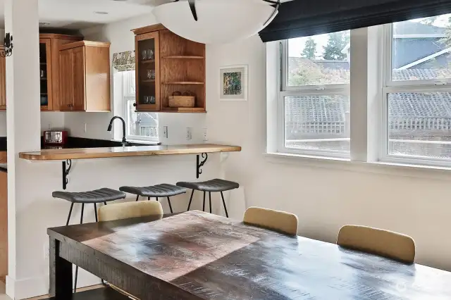 Eat-in breakfast bar in the kitchen. You will love the openness between your kitchen and dining area.