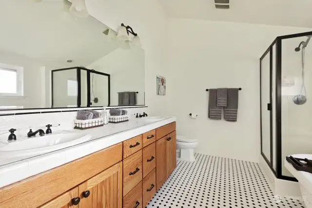 Double sinks, ceramic tile with Suntouch radiant floor heat. Your Primary Suite is your own oasis within your home.