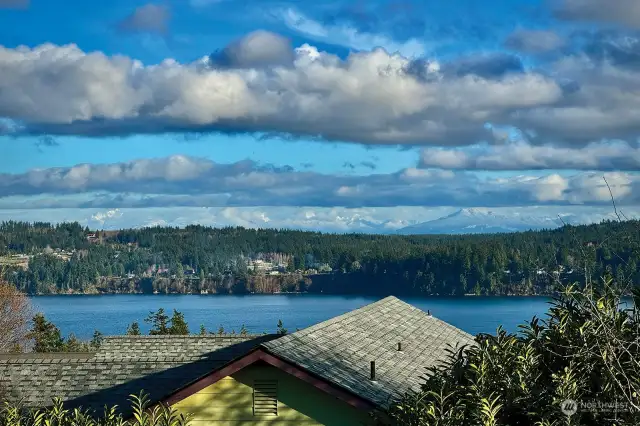 Hello Holmes Harbor and The Cascade Mountain Range! Get your morning "beauty" hit with a quick look out this upper level window.