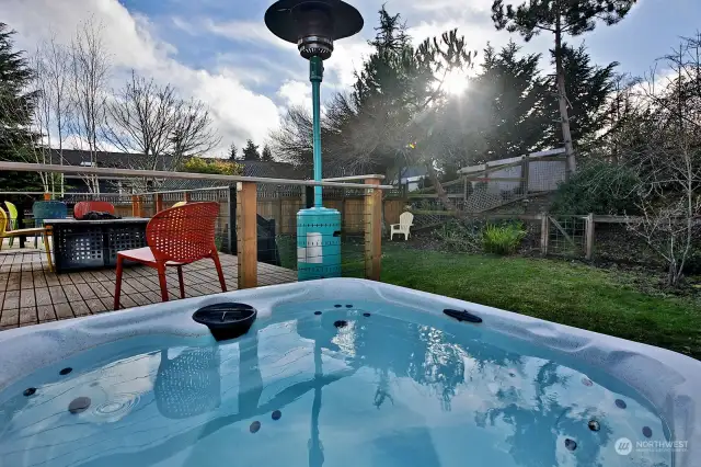 Start or end your days with a long soak in your  hot tub. This part of the yard is conveniently fenced for any pups in your world. A portion of your backyard is fenced so that Fido stays out of your garden.