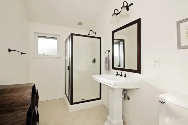 2nd Bedroom Ensuite 3/4 Bathroom with ceramic tile.