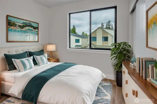 Well lit upstairs bedrooms (Different unit, floor plan, & color scheme digitally staged)