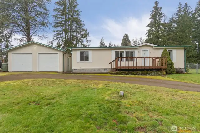 Front of home with circular driveway