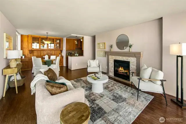 New modern gas fireplace and stylish engineered hardwood floors.