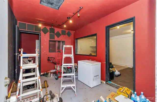 Garage conversion currently used as insulated storage unit.