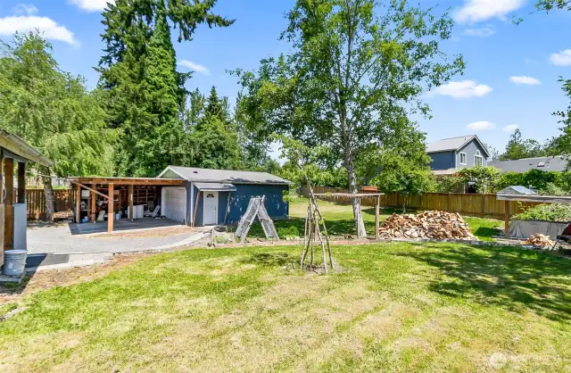 Fully fenced generous sized lot with garden space