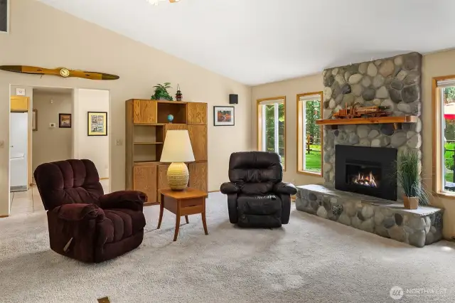 Spacious, light and airy living room with views out every window